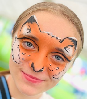 Girl with fox face paint